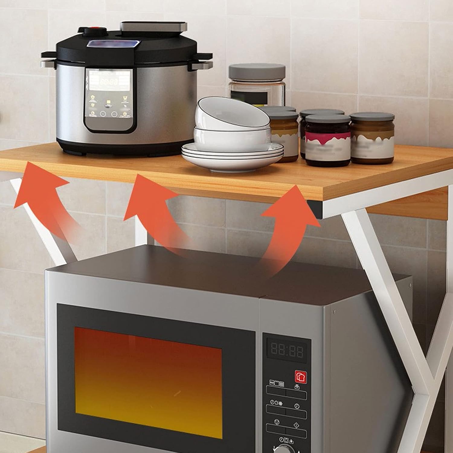 A 3-Tier Kitchen Microwave Oven Rack is Organized with Kitchen Appliances and Essentials.