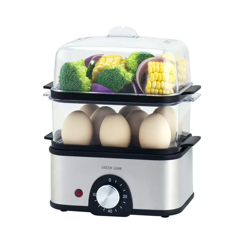 A 3-tier electric egg cooker and vegetable steamer with stacked transparent trays holding eggs, corn, and vegetables.