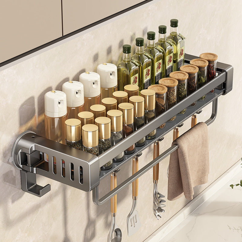 A Bathroom shelf rack is Attached to the Wall Of Kitchen Area.