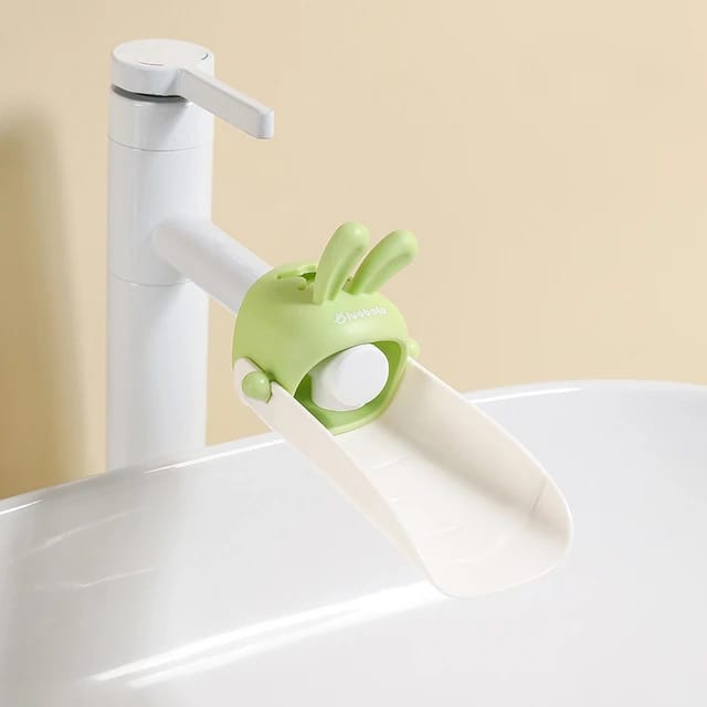 A Faucet Extender for Toddlers is Connected to Water Tap.