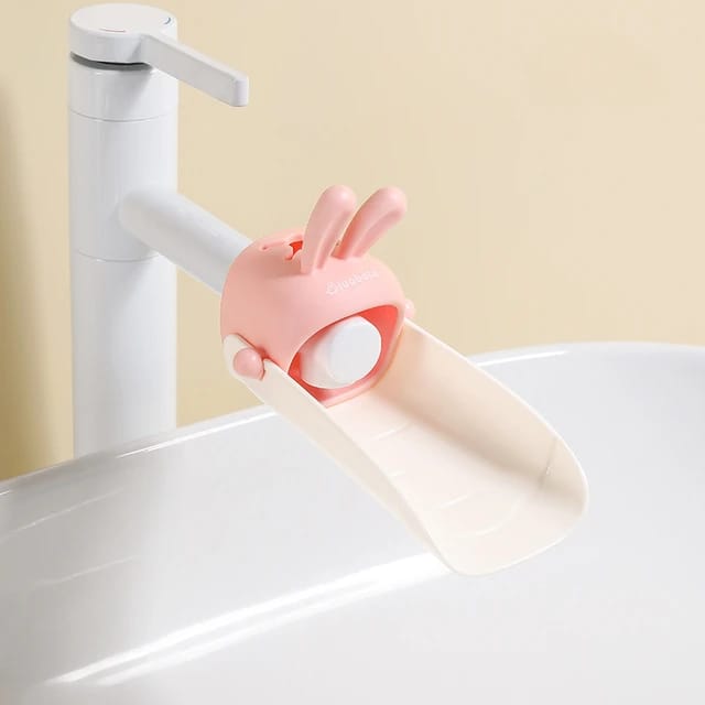 A Faucet Extender for Toddlers is Connected to Water Tap.