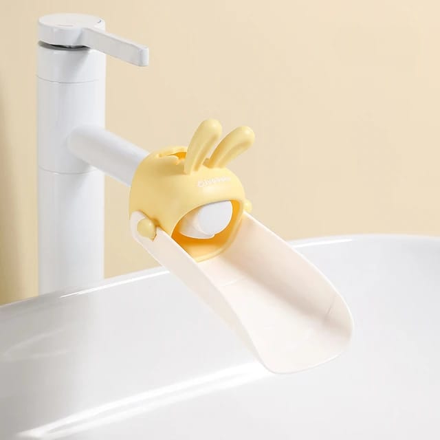 A Faucet Extender for Toddler is Connected to Water Tap.