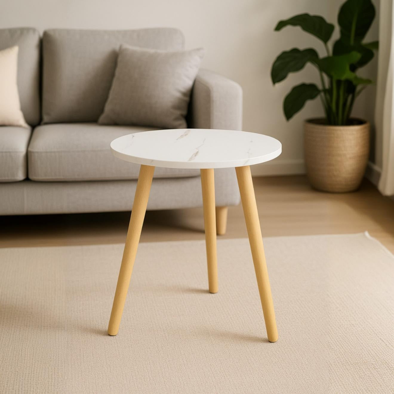 A Modern Round Wooden Side Coffee Table  Kept in a Living Area.