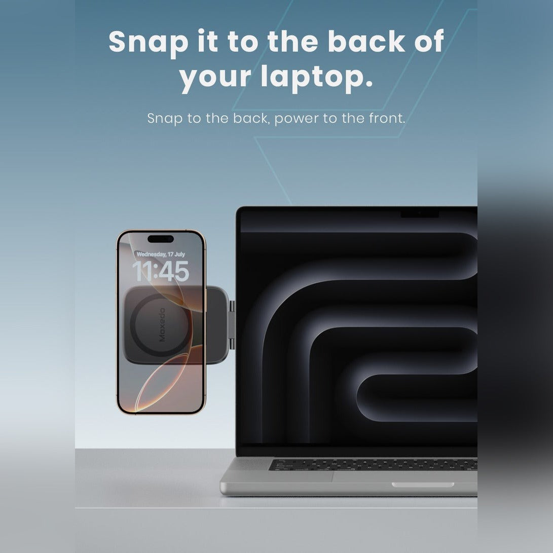 A Moxedo magnetic phone holder stand mounted on the back of a Laptop.