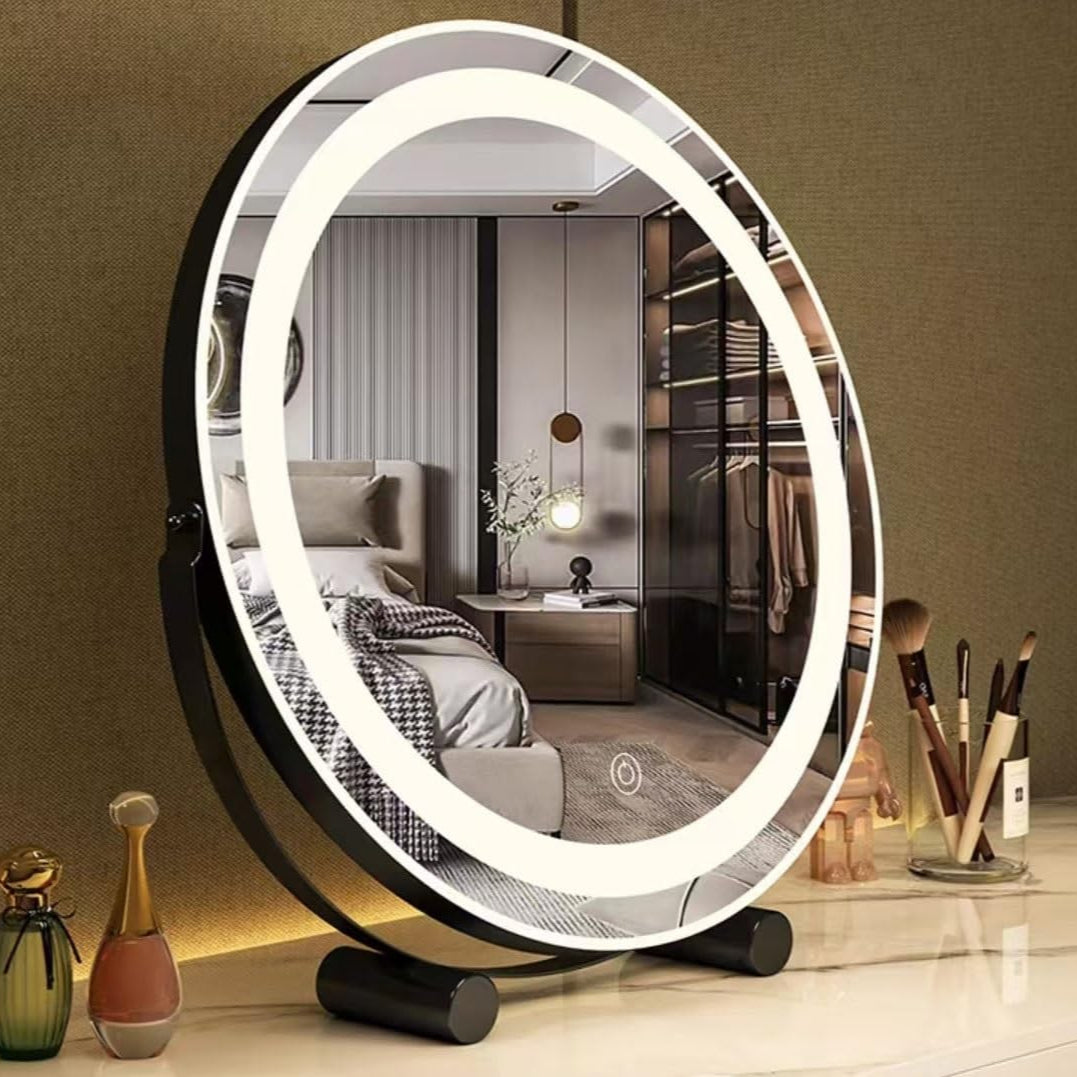 A Round LED Makeup Mirror is Placed on a Makeup Table.