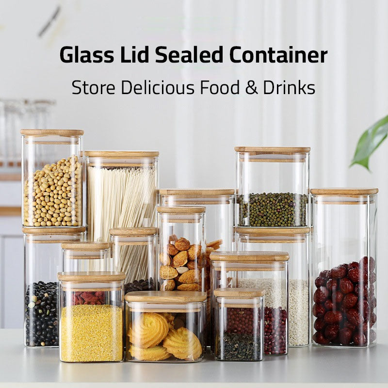 A Set Of Glass Storage Jars  are Filled with Snacks and Other Food Items.