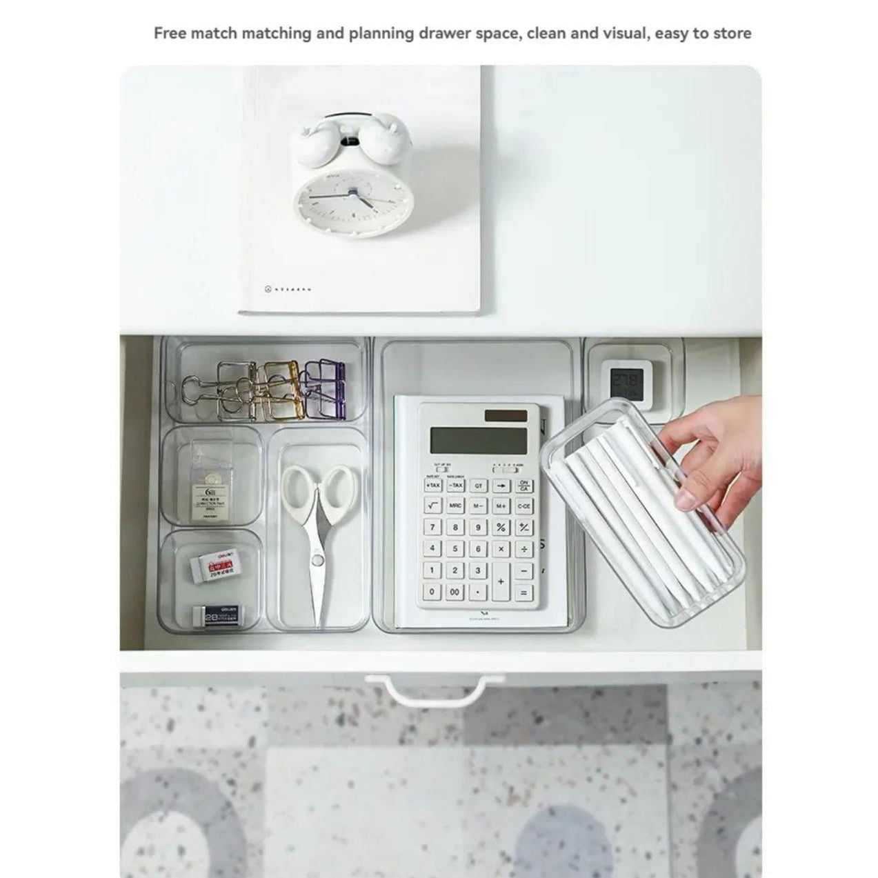 A Storage Organizer Tray is Organized with Office Essentials.