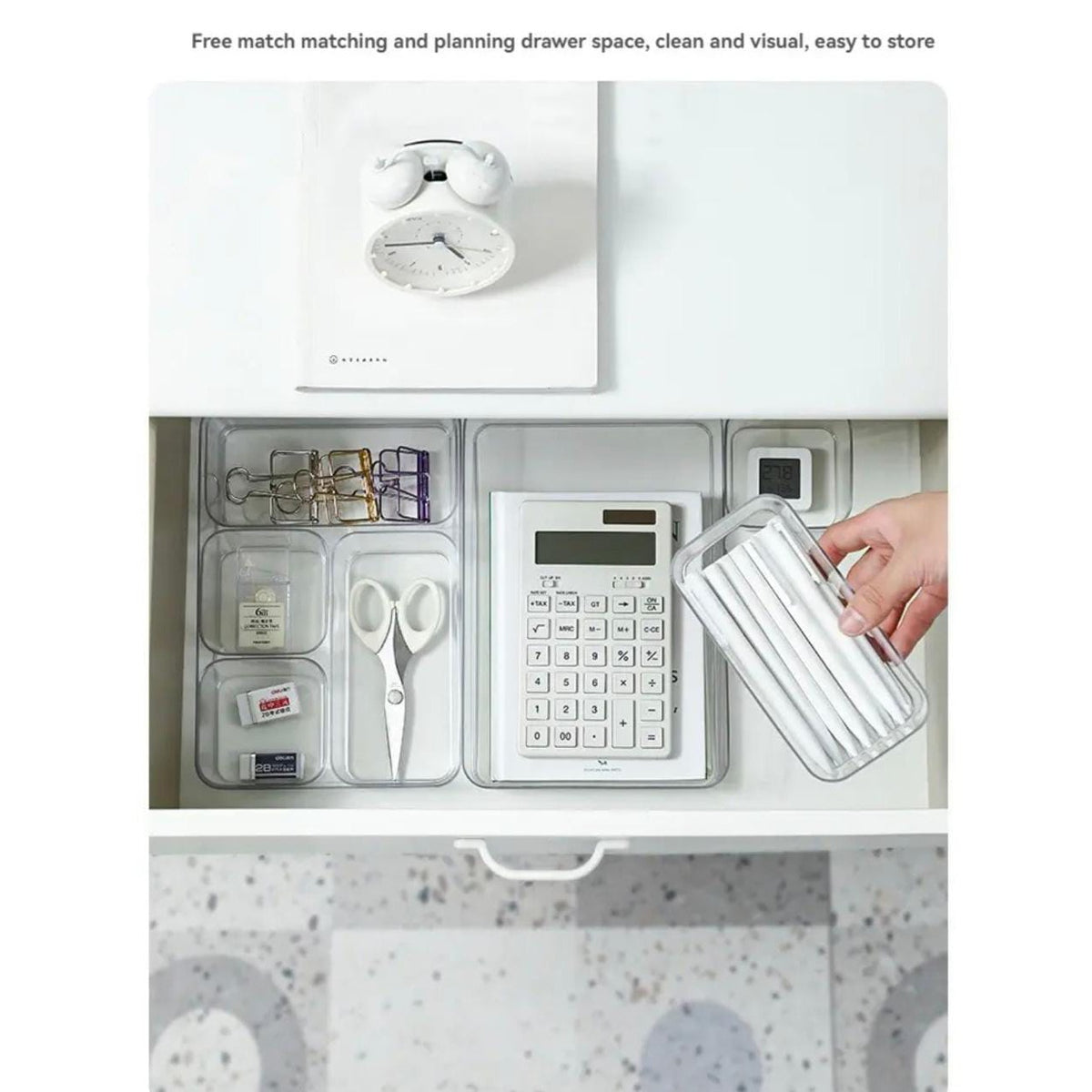 A Storage Organizer Tray is Organized with Office Essentials.