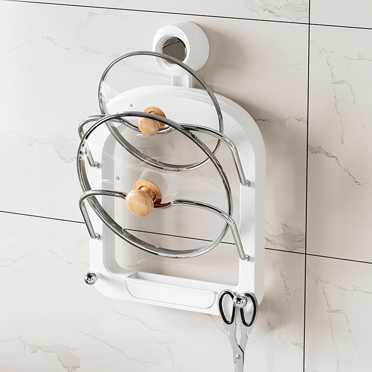 A Suction Cup Pot Lid Holder With Lids Attached on the Wall.