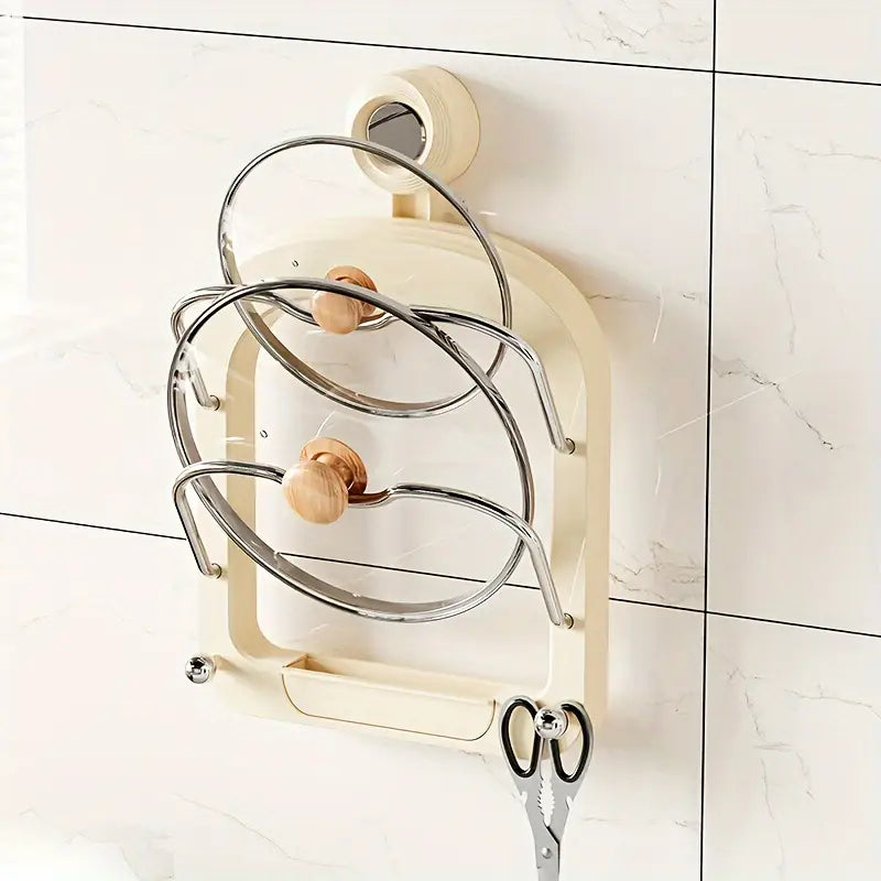 A Suction Cup Pot Lid Holder With Lids Attached on the Wall.