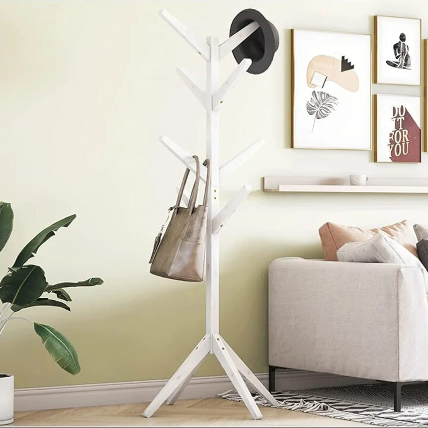 A Wooden Cloth Hanger Stand with Bag and Hat On it.