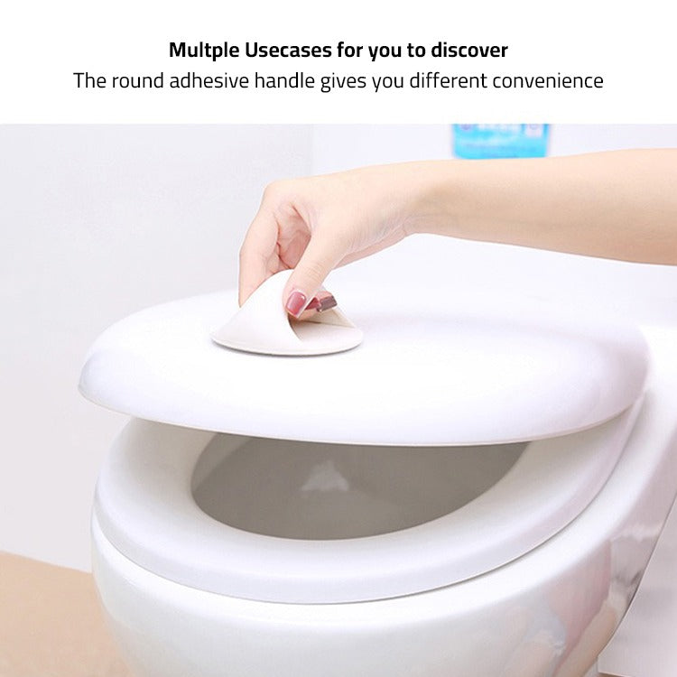 A Person is Opening Toilet Lid  Using Adhesive Toilet Seat Lifter.
