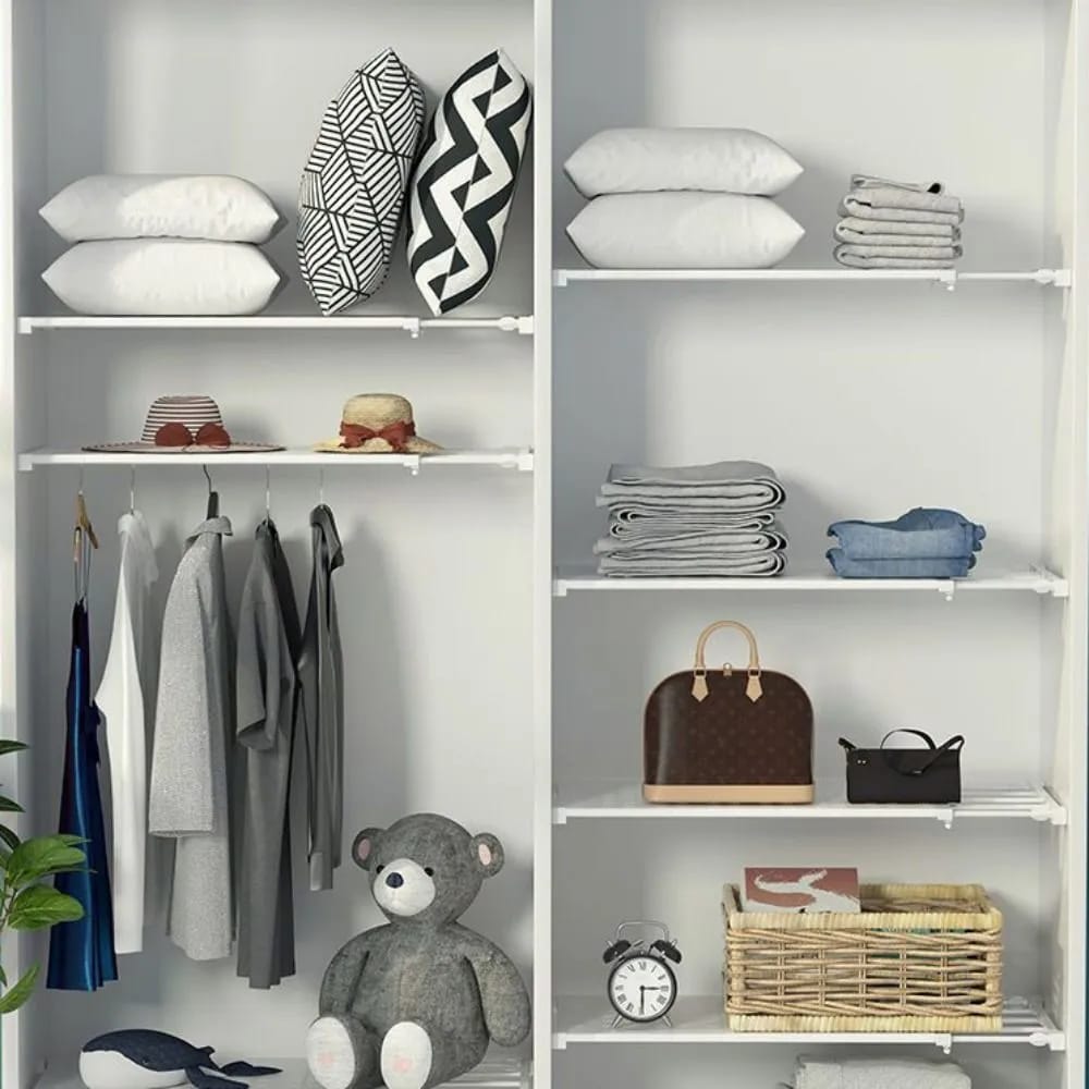 Expandable Closet Tension Shelf Divider with something arranged on it