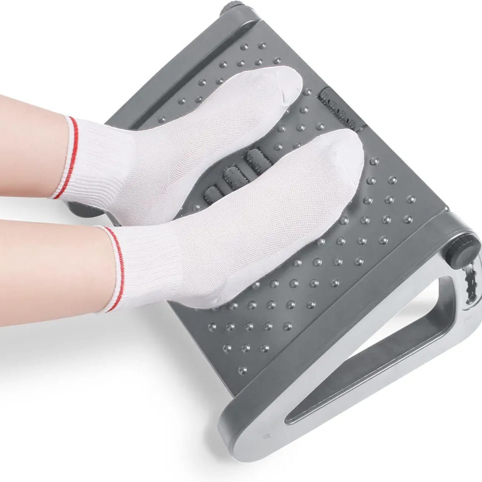 A Person Resting On the Adjustable Footrest Massager Stool.