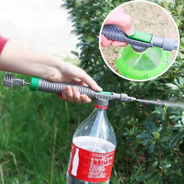 A Person is Watering Plants Using Adjustable High Pressure Sprayer.