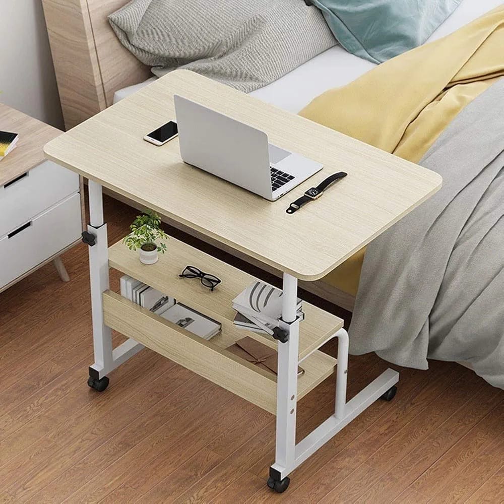 Adjustable Laptop Computer Desk with Bottom Shelf Placed Near Bedside.