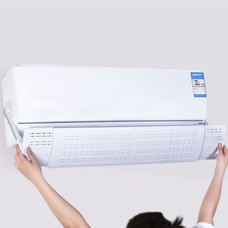 A Person is Fixing Air-Conditioner Wind Deflector Shield Baffle On Air Conditioner.