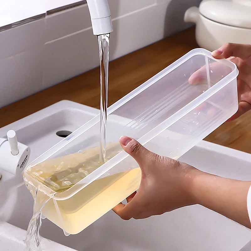 A Person is Cleaning Airtight Rectangular Storage Box.