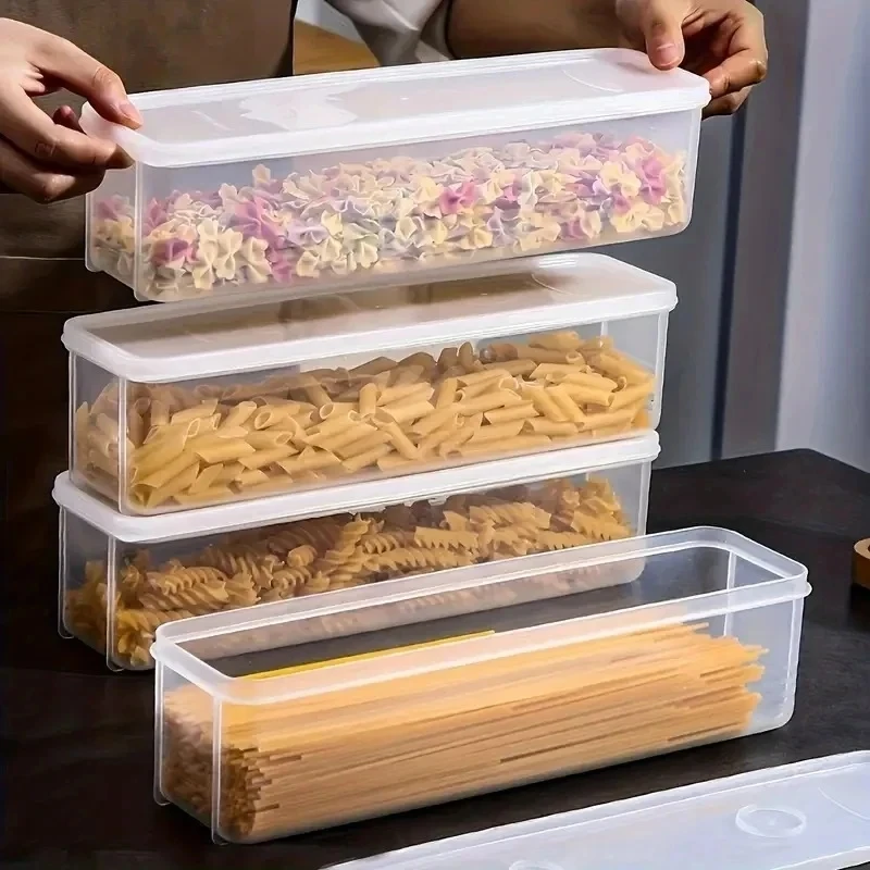 A Person is Storing Noodles and Pasta in a Airtight Rectangular Storage Box.