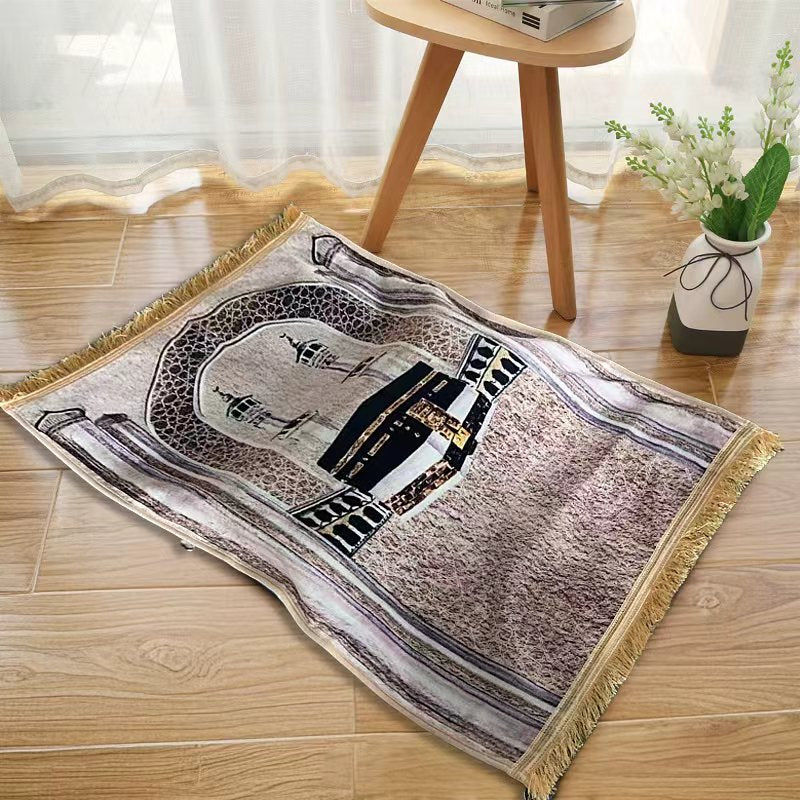 An Islamic Prayer Mat is  Spread Out in a Floor.
