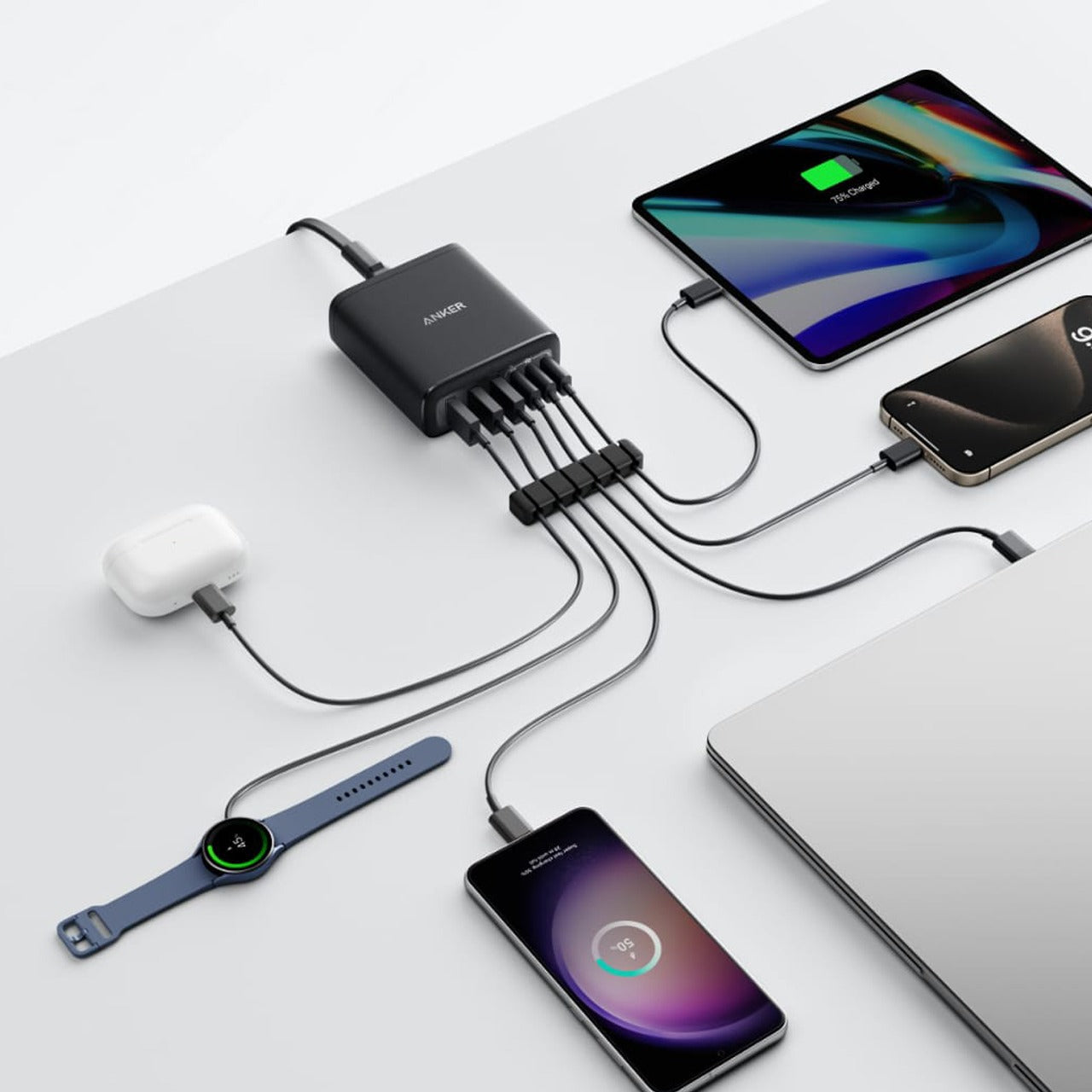 An Anker 6-Port Charger for charging laptops, tablets, smartphones, earbuds, and smartwatches all at once with safe, ultra-fast performance.
