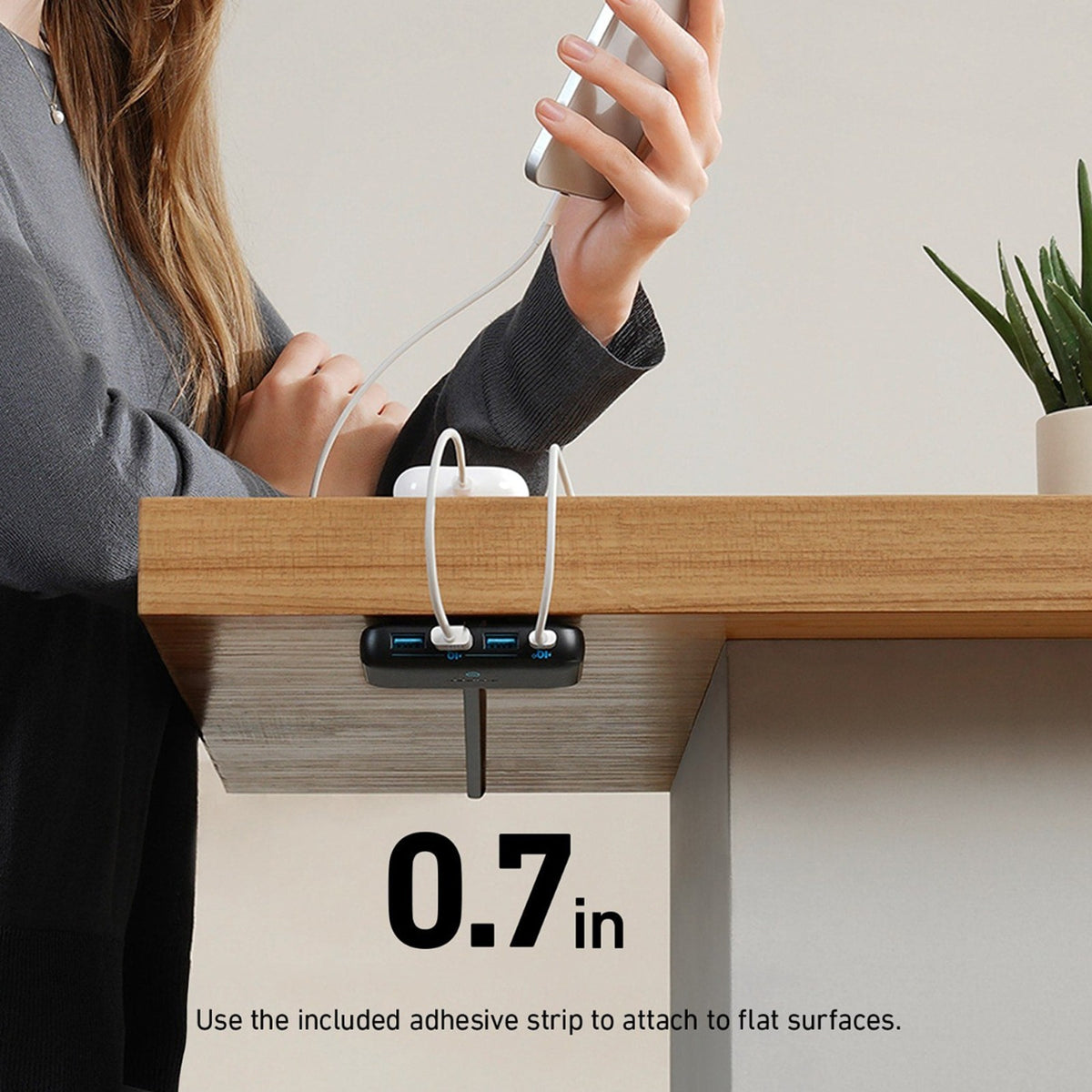Anker PowerPort Atom 3 Slim 65W placed on the high-end of the table