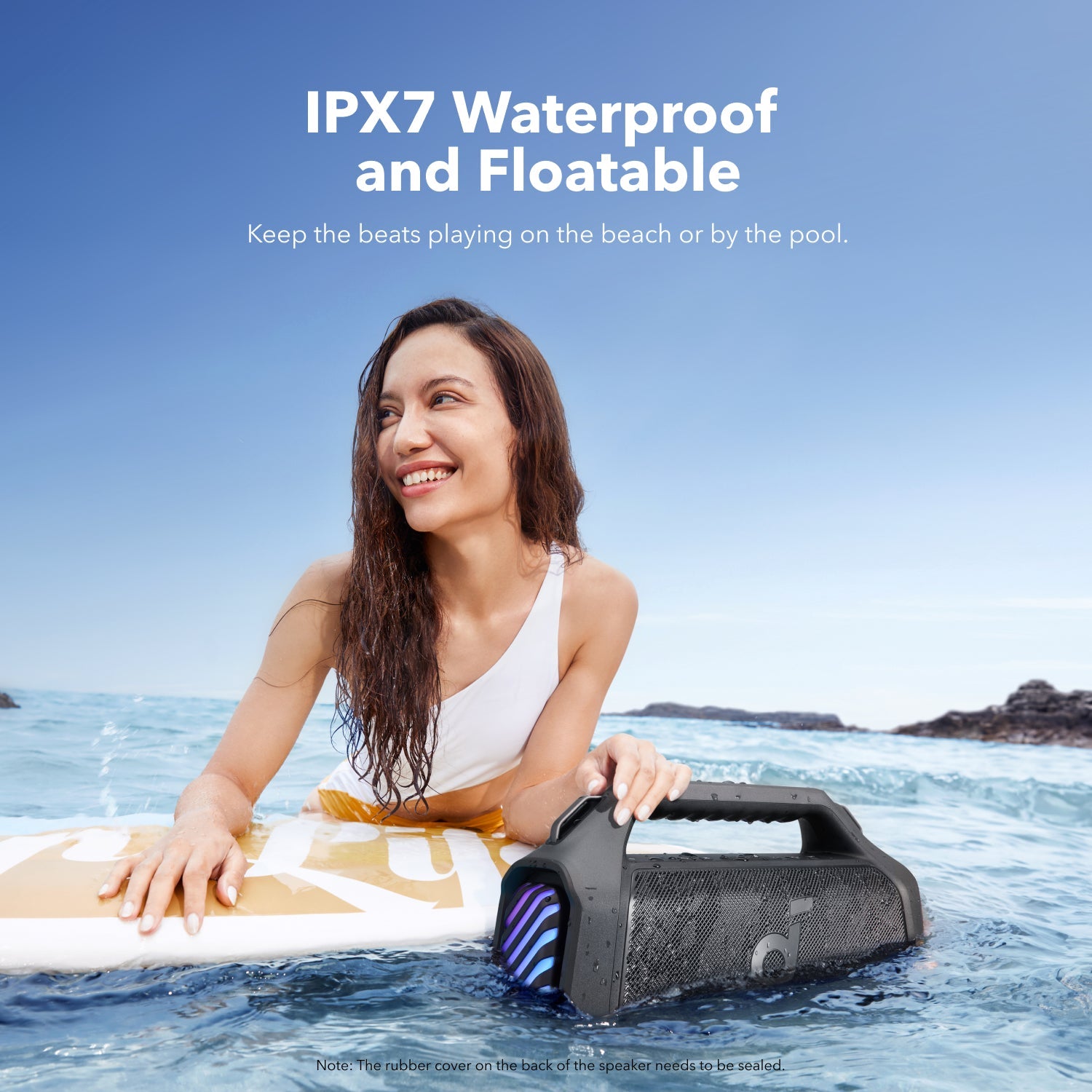 A Woman is Enjoying with Anker Soundcore Boom 2 Plus Portable Bluetooth Speaker .