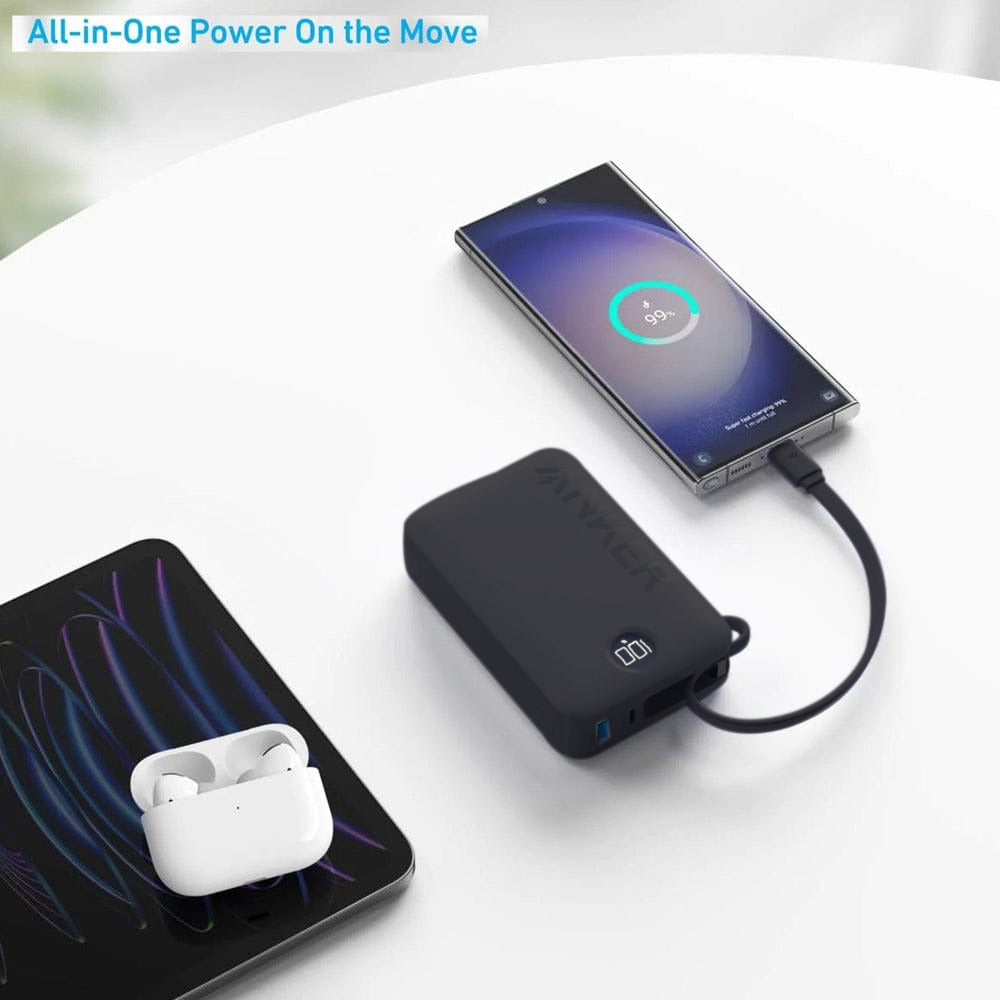 Mobile Phone is Connected to Anker Ultra Compact Power Bank (20,000 mAh, 22.5W, Built- In -USB- C Cable) - A1647H11 and Tablet, Airpod is Placed Nearby.