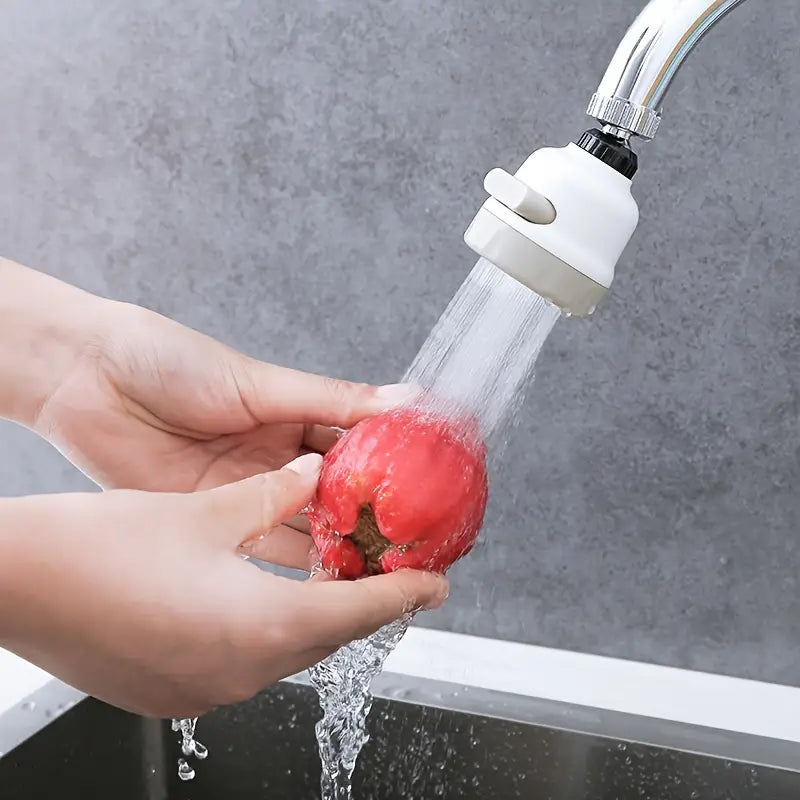 A Person is Washing Fruit From Tap Which is Connected With Kitchen Shower Faucet Tap Head.