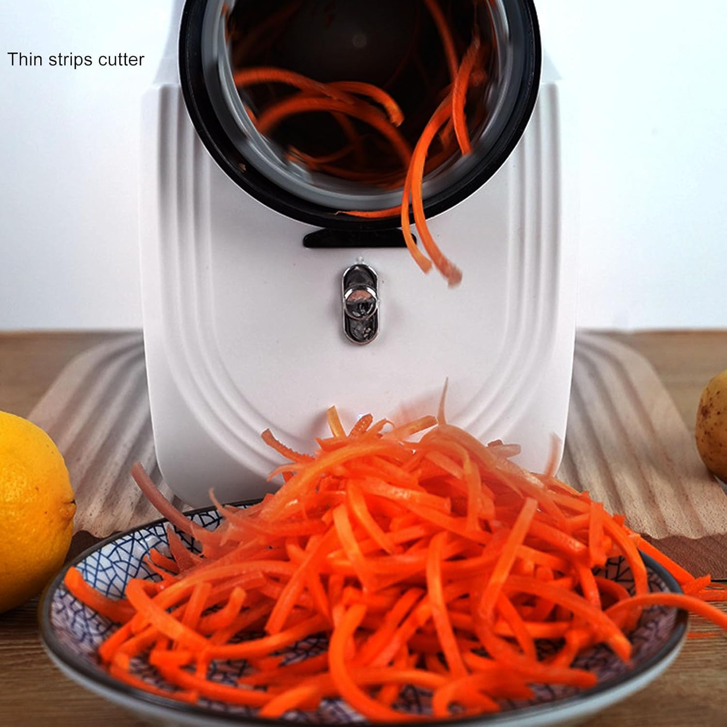 An Automatic Vegetable Cutter Chopper Machine Slicing Carrot.
