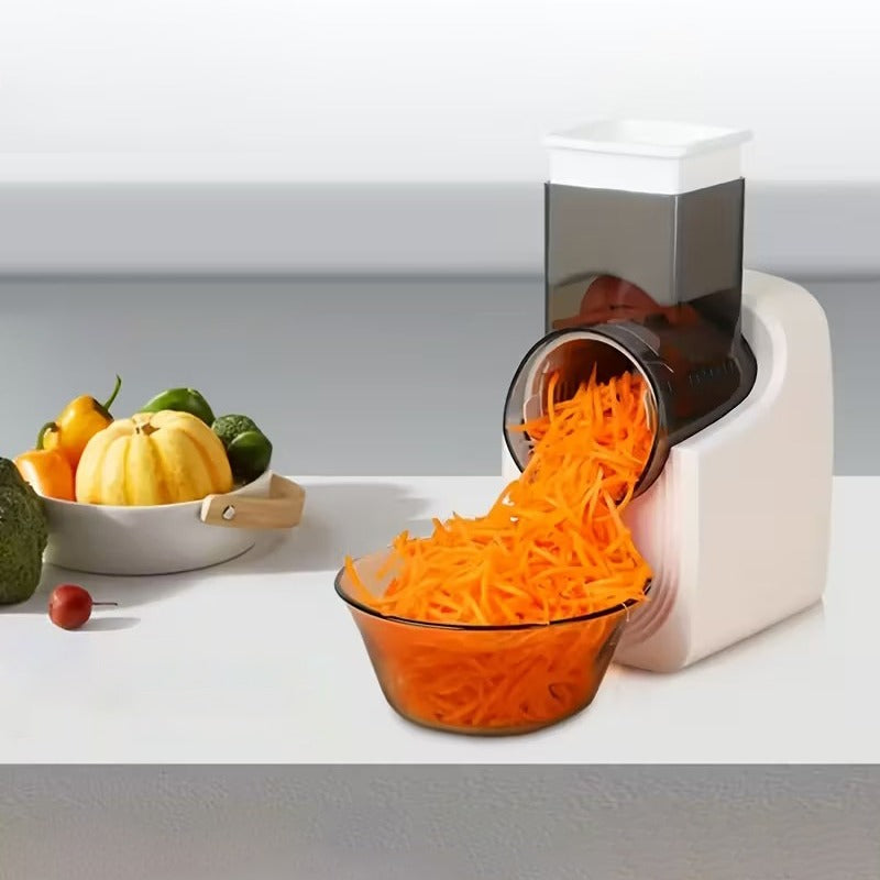 An Automatic Vegetable Cutter Chopper Machine Grating Carrot.