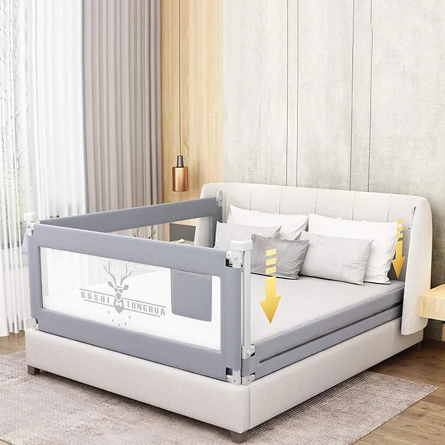 A Bed is Protected with Baby Bed Rail.