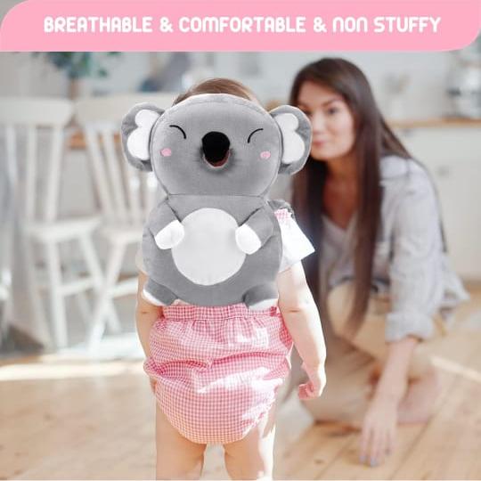 A Baby is Wearing Baby Head Protector Pillow.