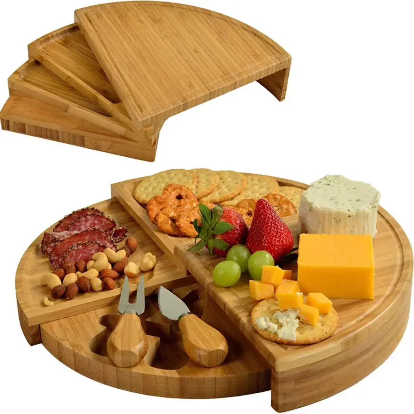 Bamboo cheese board and knife set with an assortment of cheeses, crackers, grapes, nuts.