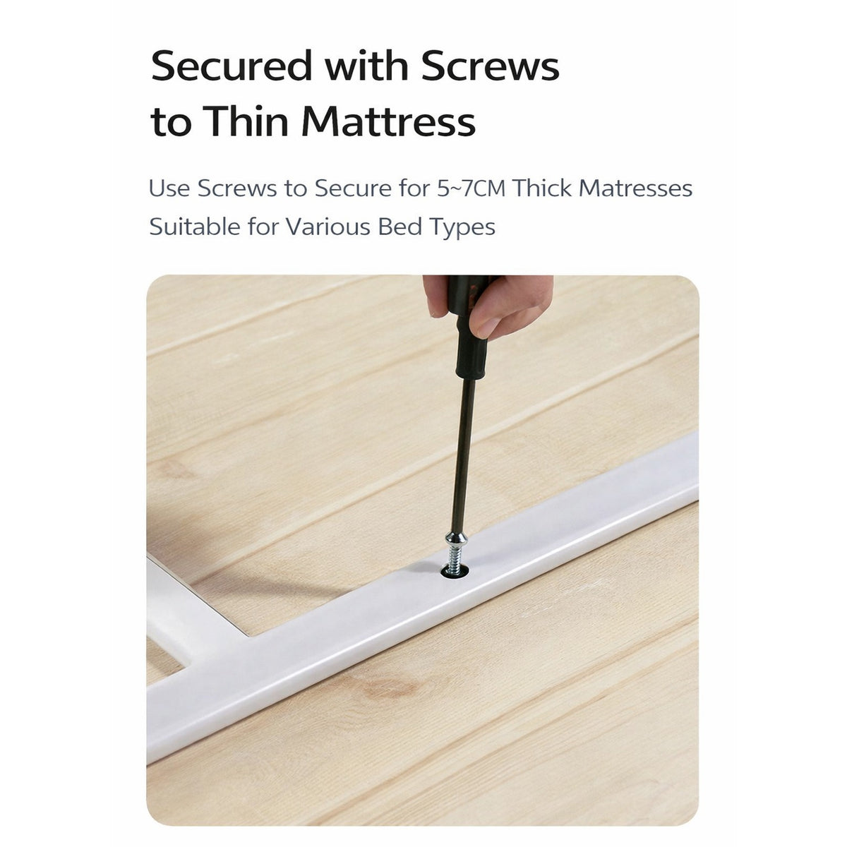 A Person is Securing Bed Assist Rail with Safety Handle with Screws.