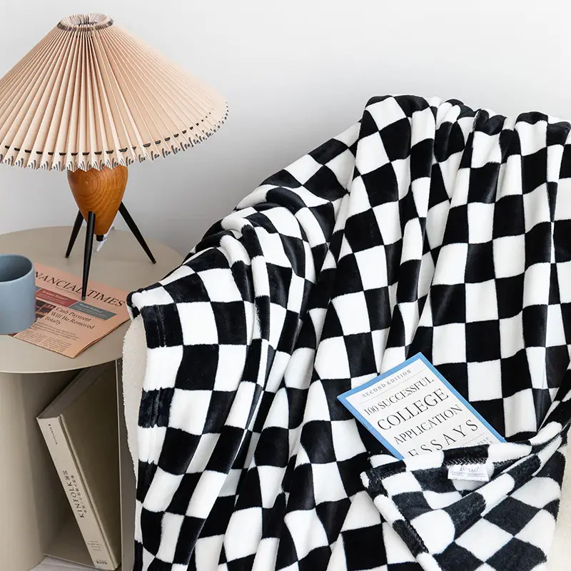 Ultra Soft Flannel Fleece Blanket is Kept On a Chair.