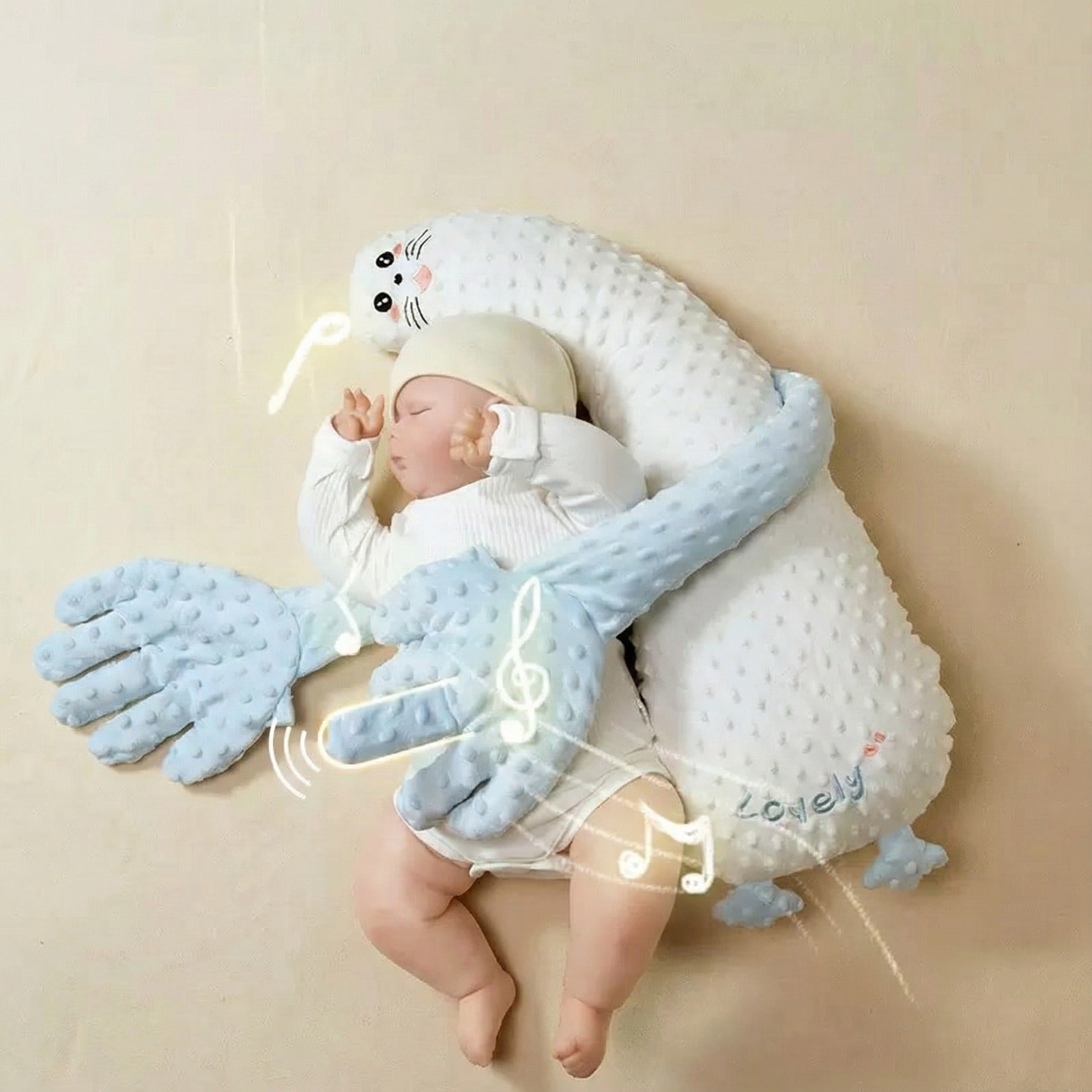 Baby sleeping comfortably in a Baby Patter cushion that cuddles and soothes with gentle arms.