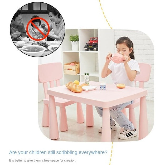 A Girl is Eating on Multi-Purpose Kids Table and Chair Set.