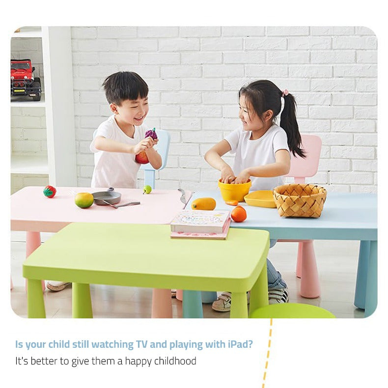 Two Children are Eating Fruits By Sitting On Multi-Purpose Kids Table and Chair Set.