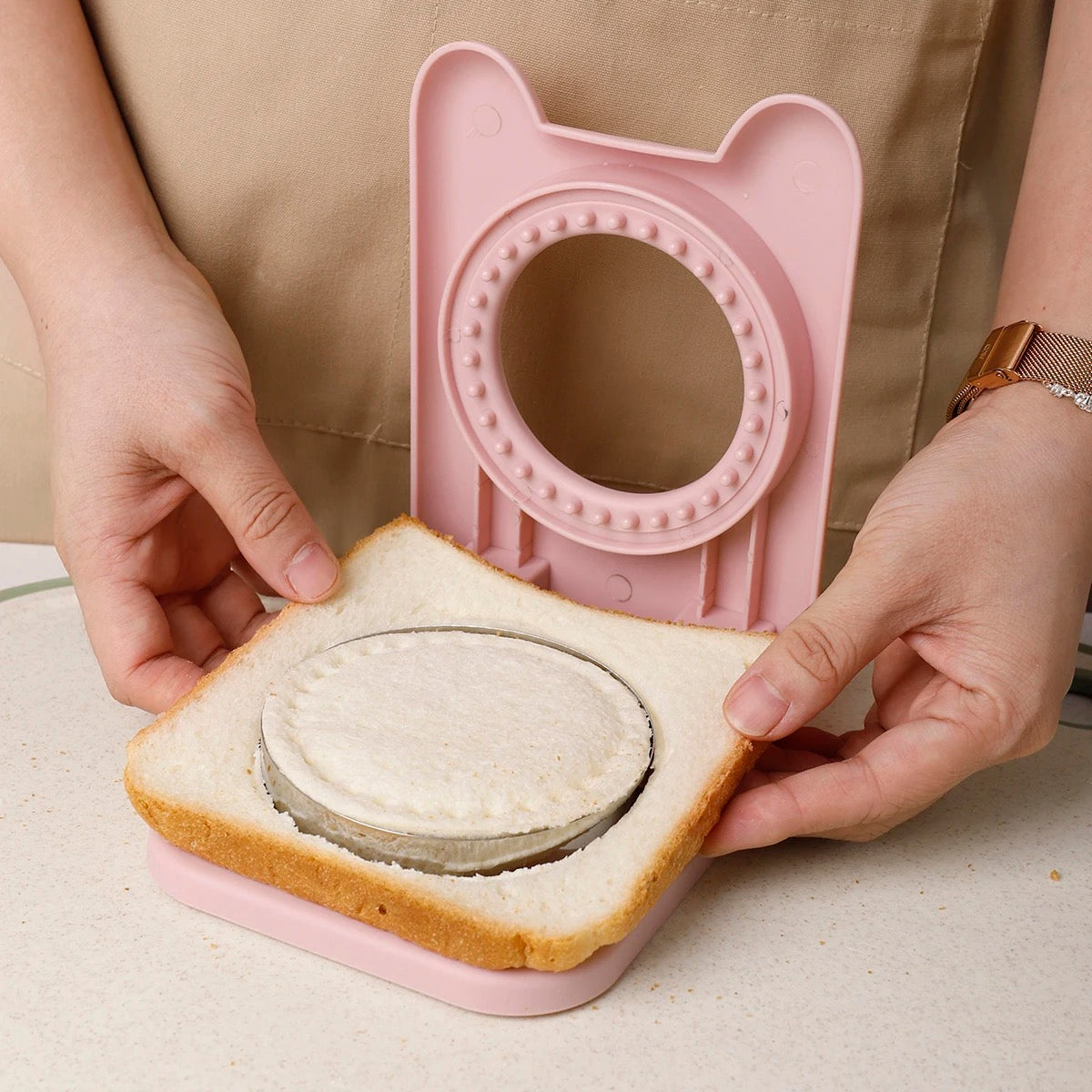 someone making Pocket Sandwiches with help of Bread Sandwich Cutter and Sealer