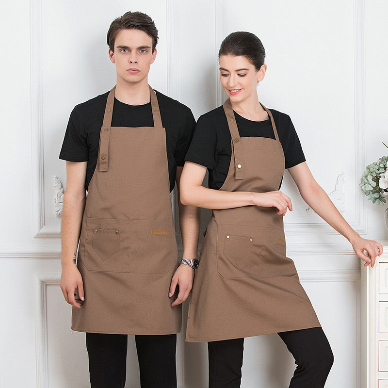 A Men and Women is Wearing Brown Unisex Adjustable Kitchen Chef Apron.