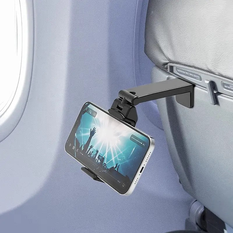 A Mobile Phone Is Placed On Aircraft Seat Using Universal Mobile Phone Mount Holder.