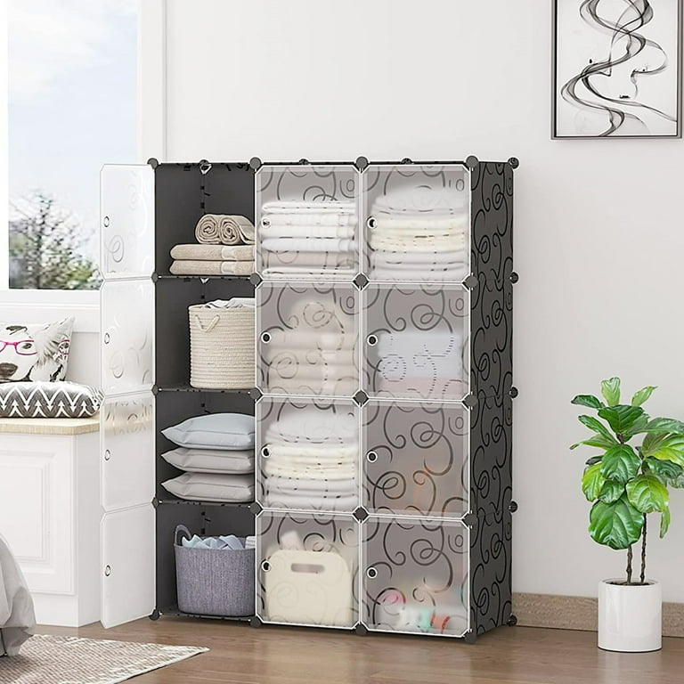 A Cabinet Storage Wardrobe Organizer with Clothes are Placed in a Room.