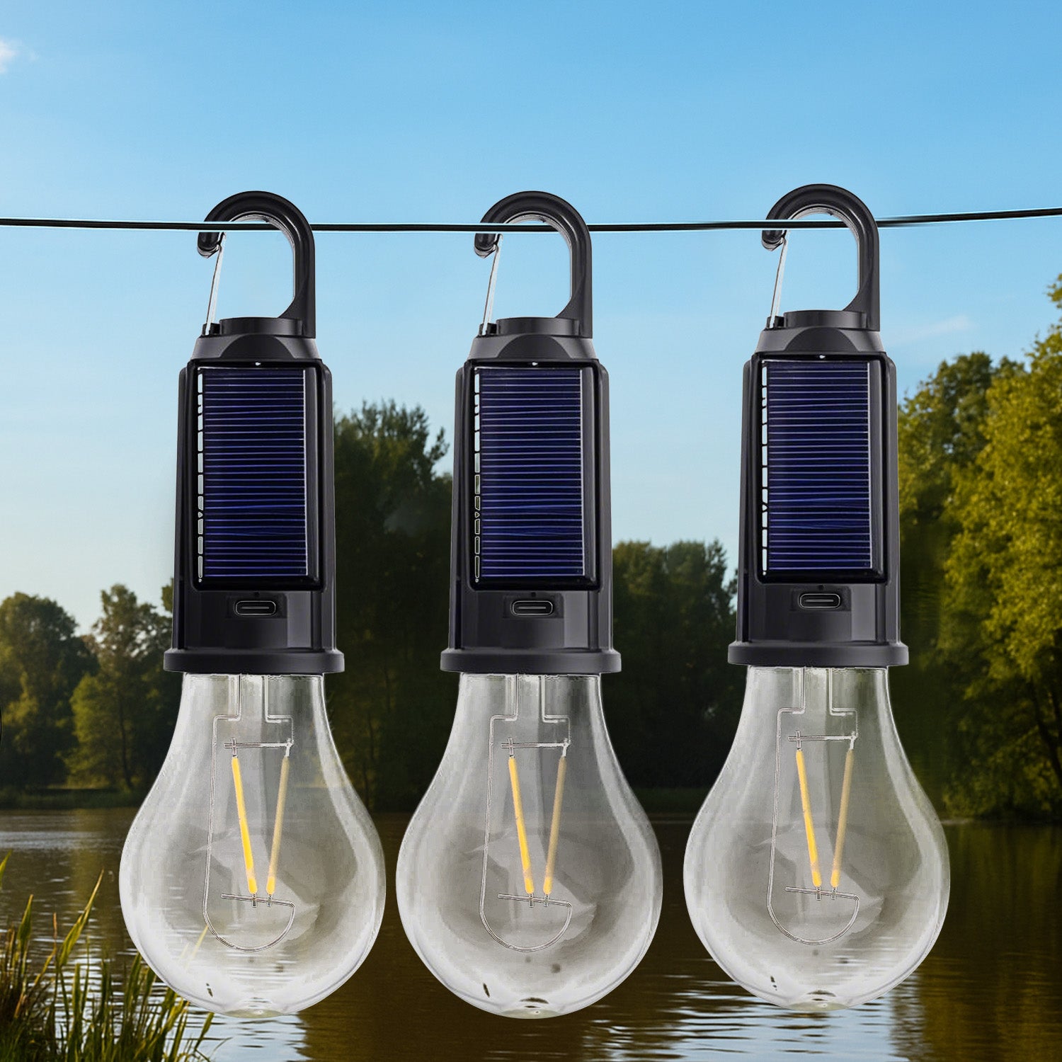 Three Camping Lamps are Hanged Near Camping Area.