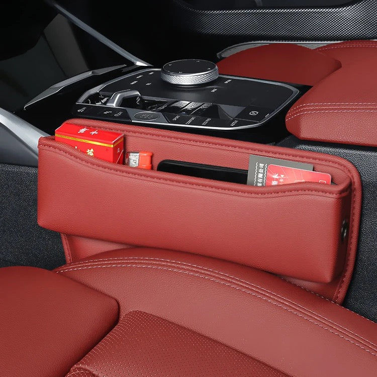 Car Seat Gap Storage Box Organizer  with some items in it