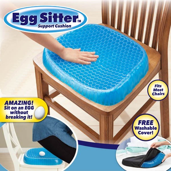 Someone placing an Egg Sitter Gel Chair Cushion on a chair