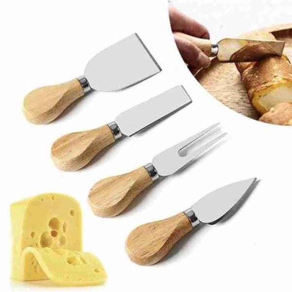 A Person is Cutting Croissant Using Knife Set Of Cheese Board Platter and Knife Set.