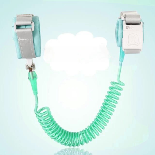 A Child Safety Harness Leash in Green Color.