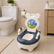 Children's potty chair with cartoon design in a bathroom setting