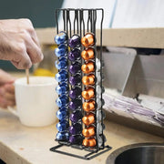 A Person Is Making Coffee By Taking Capsule From Coffee Pod Storage Rack Dispenser.